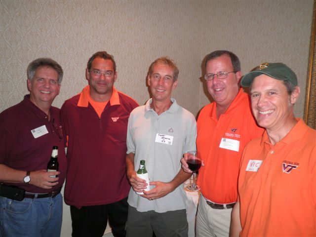Five brothers in maroon and orange with name tags, September 2012