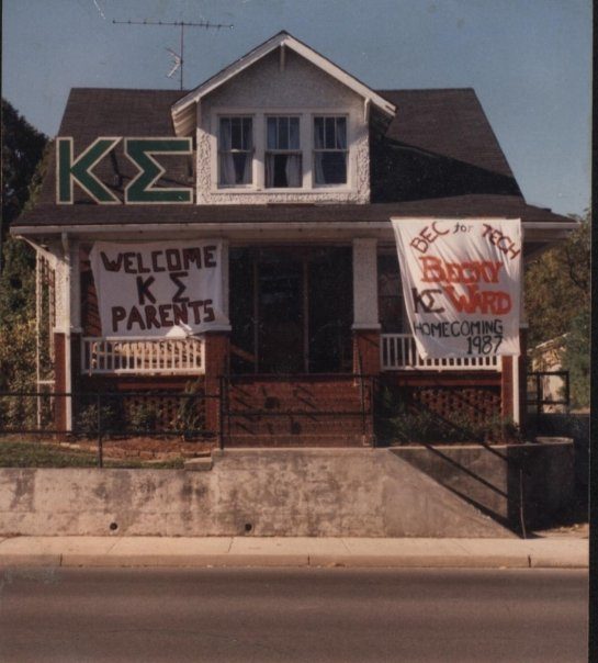 The house with Kappa Sigma letters and a Welcome Parents banner across the porch