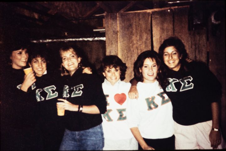Five women in Kappa Sigma sweatshirts
